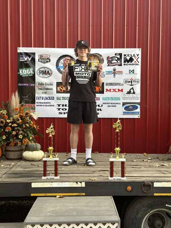 Grant Robinson on the podium at the 8th annual 2'Smokin Showdown at Muddy Waters MX